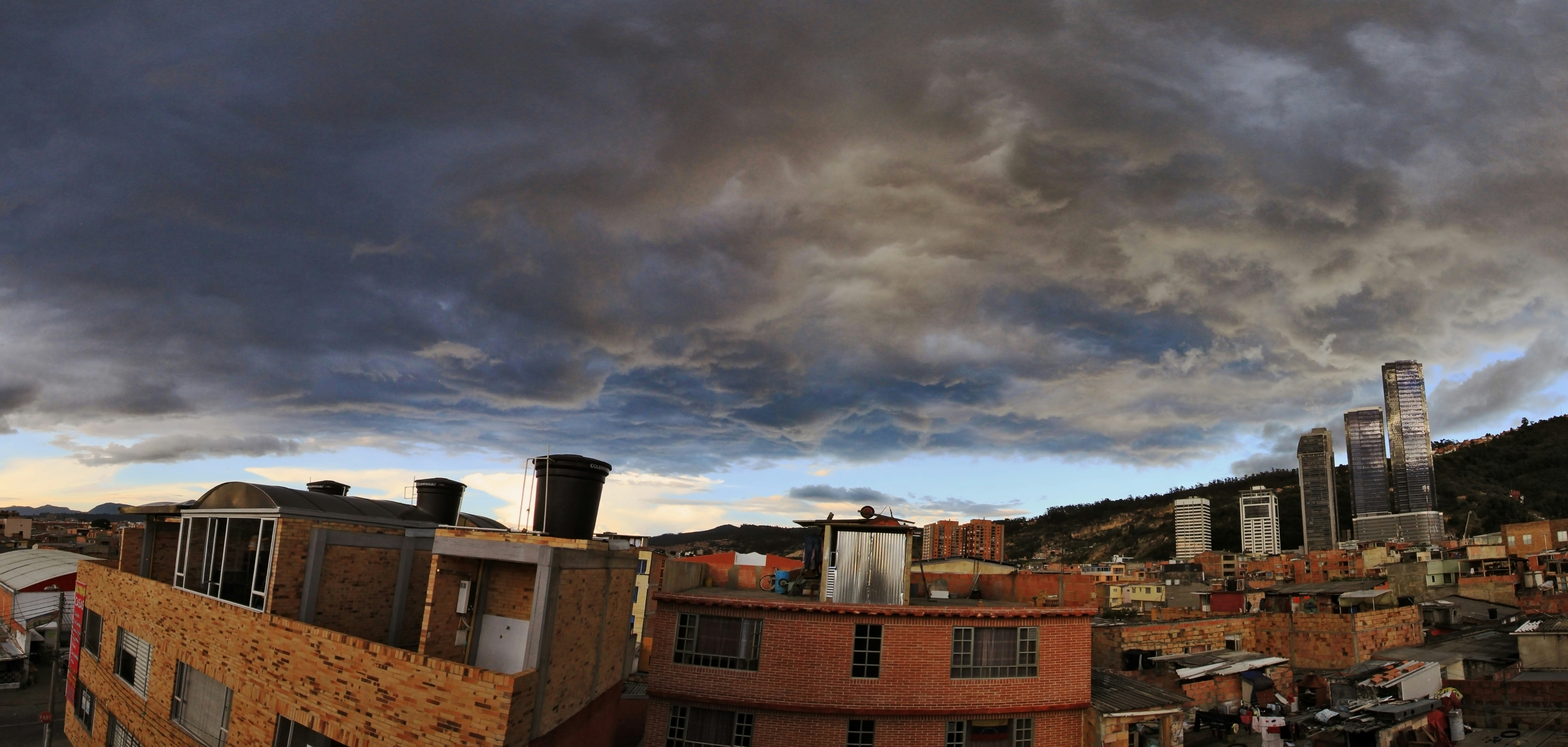 aerial view photography of buildings under clouds